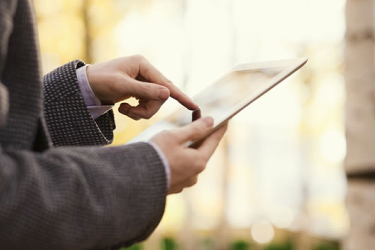 Someone using an iPad