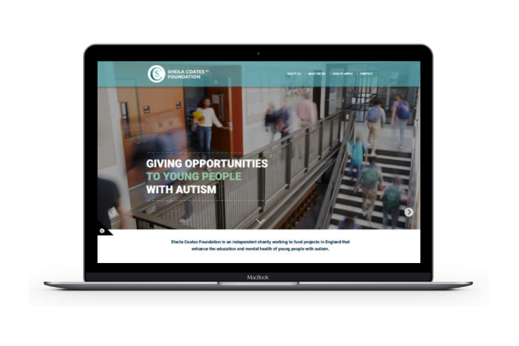 A screenshot of the website on a MacBook Pro laptop